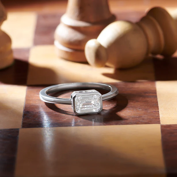 Sleek Emerald Cut Bezel Ring - Image 3